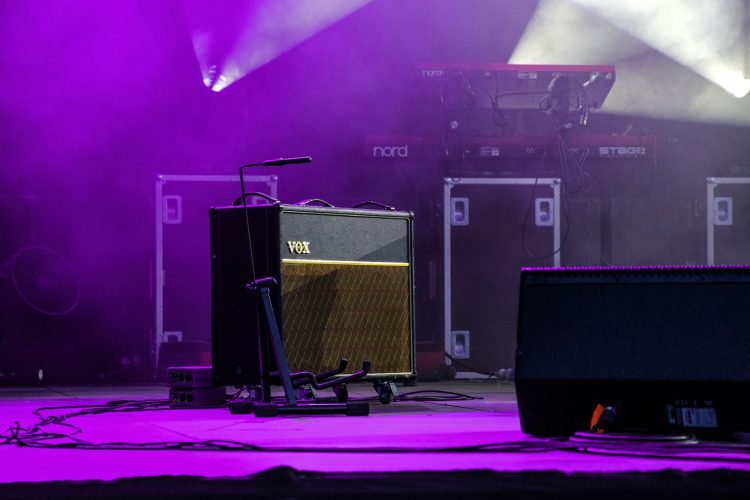 purple-hues-vintage-sound-amplifier-on-a-stage-at-a-concert-music-musical-playing-music-musical_t20_Xx7mg9